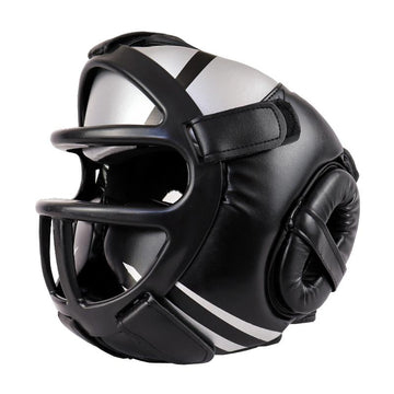 Black and white boxing helmet with face guard on a white background