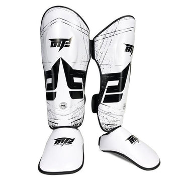 White and black shin guards with a brand logo on a white background