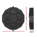 Black octagonal device with geometric patterns and measurements on a white background