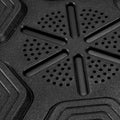 Close-up of a black textured mat with geometric patterns