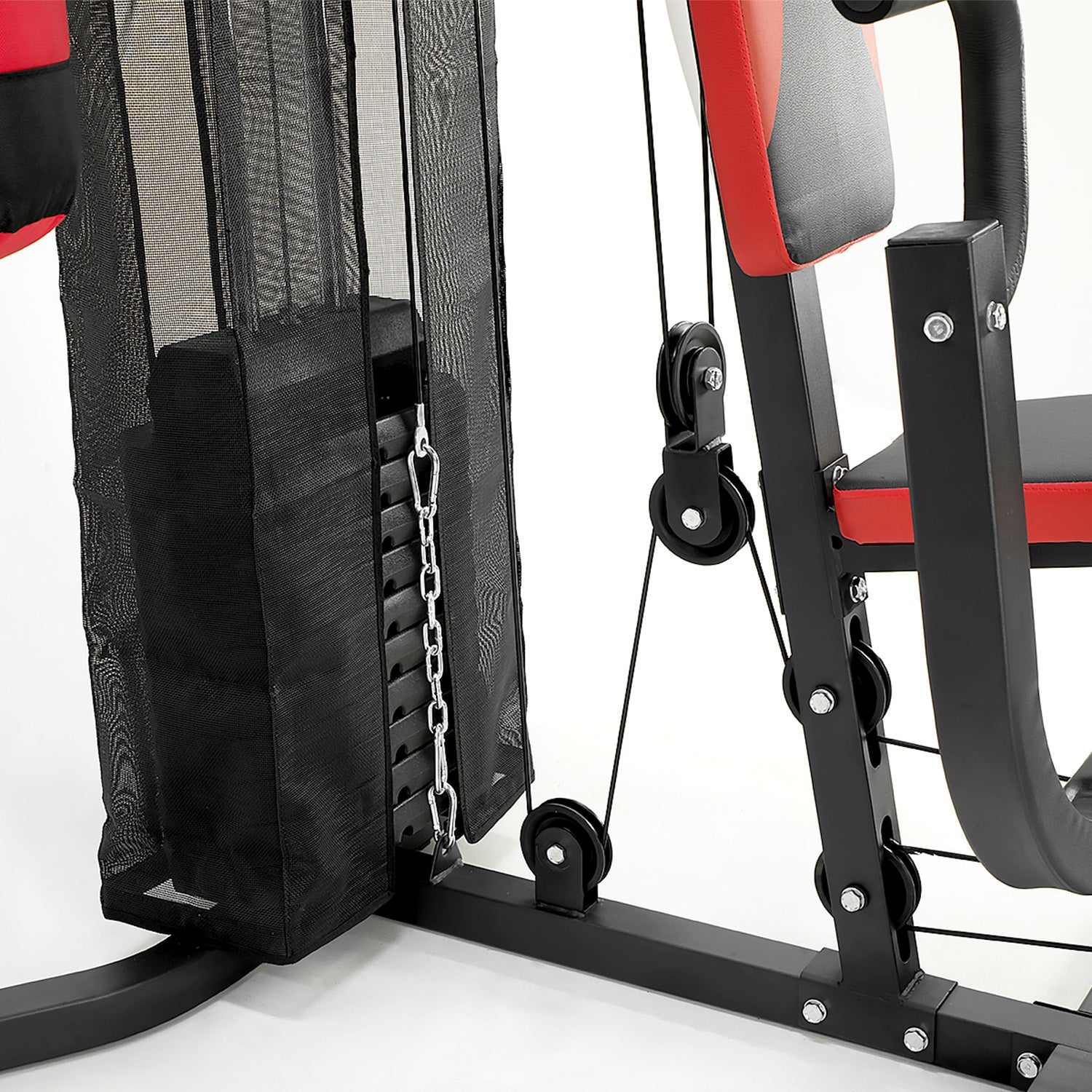 Close-up of a weight lifting machine with pulleys and weights on a white background