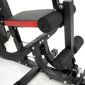 Close-up of a gym machine with black and red design on a white background