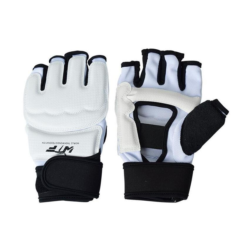 Pair of white and black gloves with visible branding on a white background