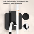 Black wall hook with 5cm widened Velcro for stable installation on a white background.