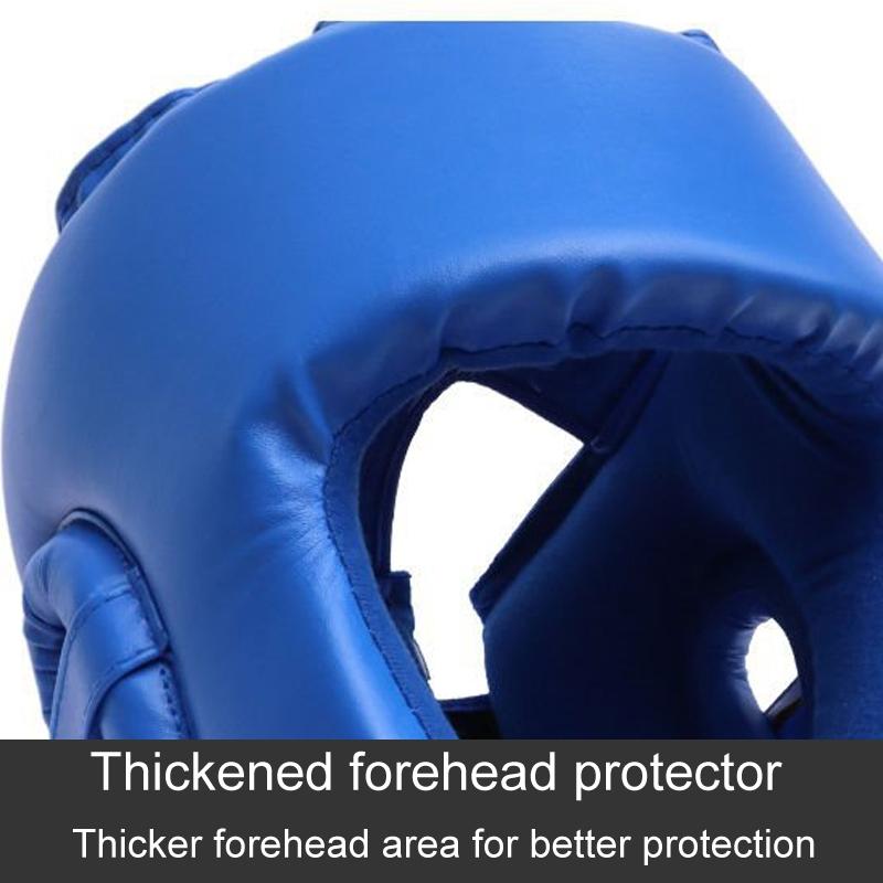 Blue boxing headgear with a thickened forehead protector on a white background