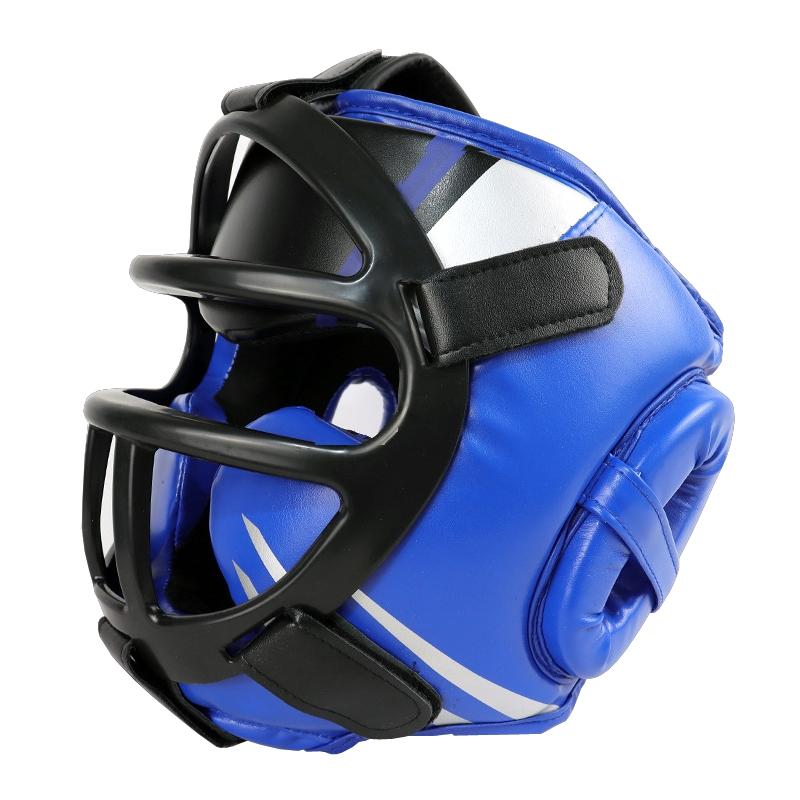 Blue boxing headgear with black face guard on a white background
