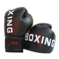 Black boxing gloves with 'BOXING' written on them on a white background