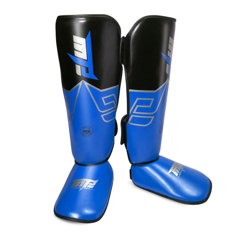Yellow and black shin guards with a brand logo on a white background