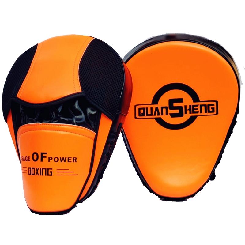 Orange and black boxing focus mitts with 'Quan Sheng' branding on a white background
