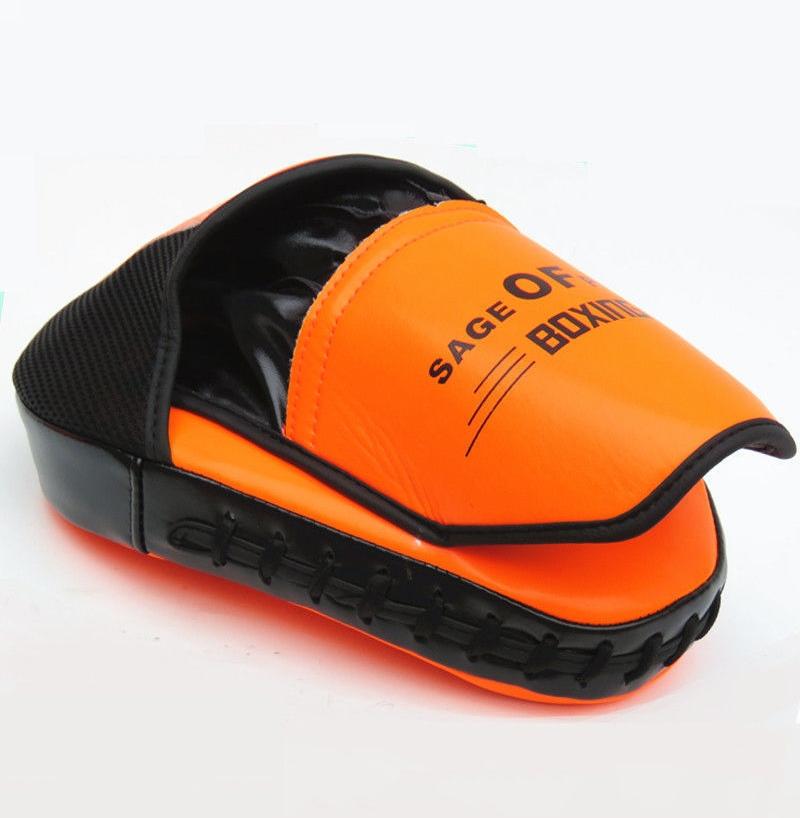 Orange and black boxing mitt on a white background