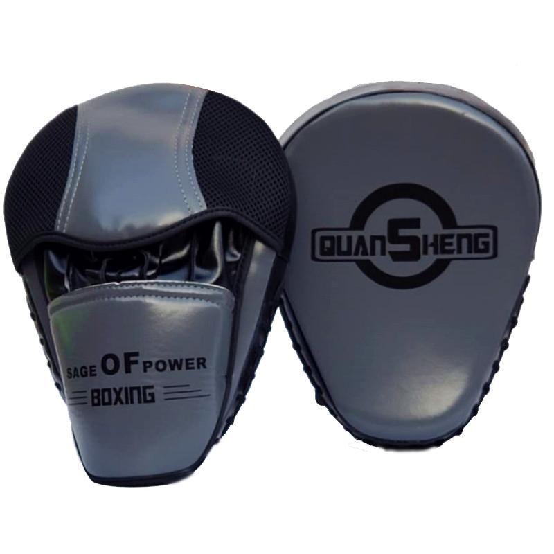 Pair of boxing focus mitts with 'Quan Sheng' branding on a white background