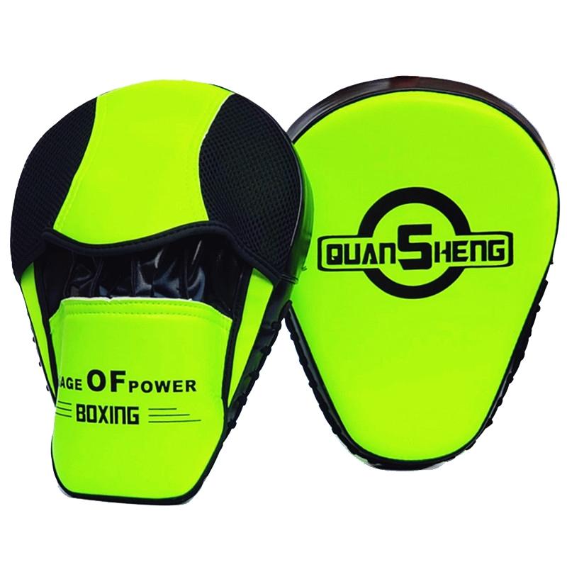 Pair of green boxing focus mitts with 'Quan Sheng' branding on a white background