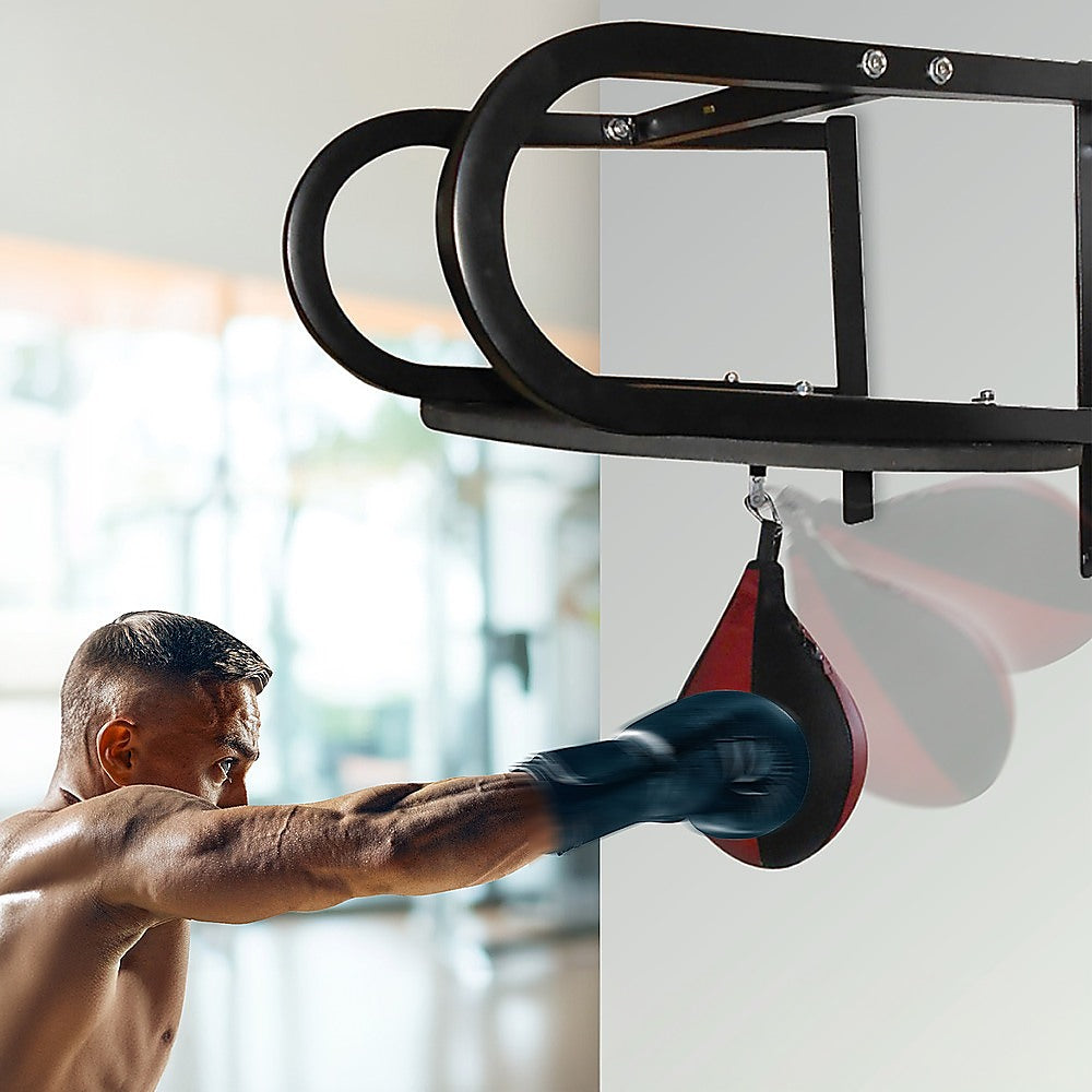 Black boxing speed bag stand with a red and black speed bag on a white background