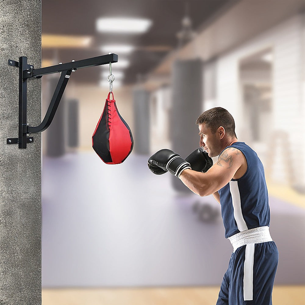 Black metal punching bag stand on a white background