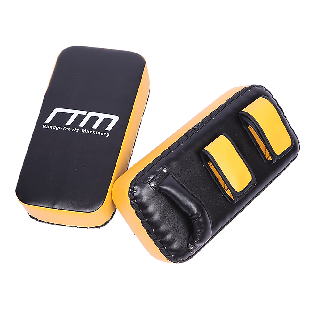 Black and yellow boxing pads with 'RTM' branding on a white background