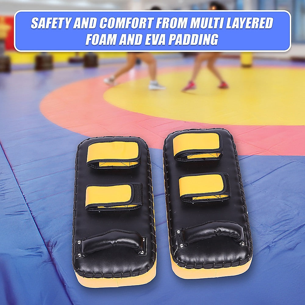 Black and yellow martial arts protective pads on a colorful mat with text about foam and EVA padding.
