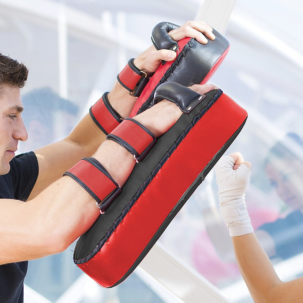 Black and red martial arts training pads with 'RTM' branding on a white background