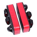 Red and black martial arts training pads on a white background