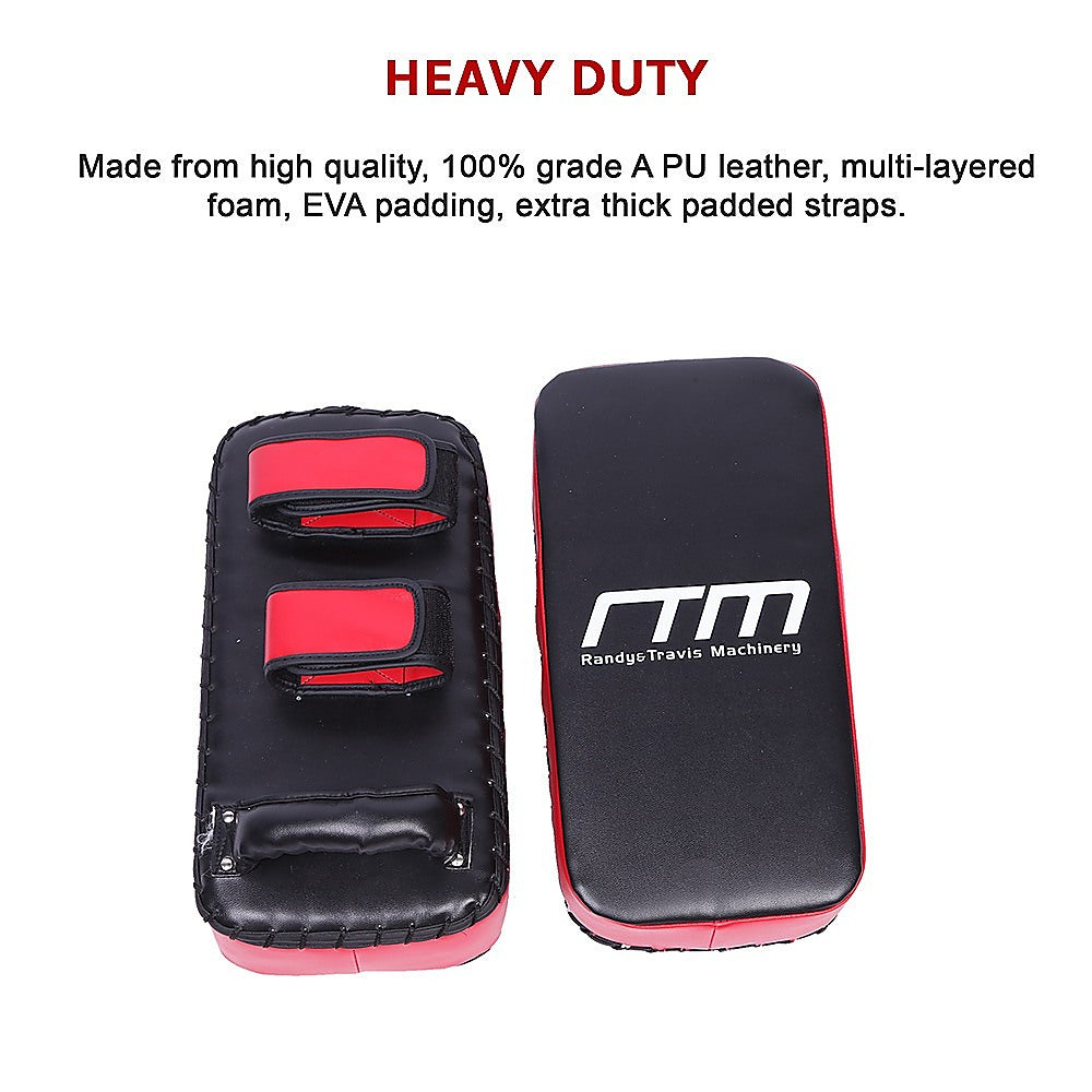 Heavy-duty black and red martial arts training pads with Randy Travis Machinery logo on a white background.
