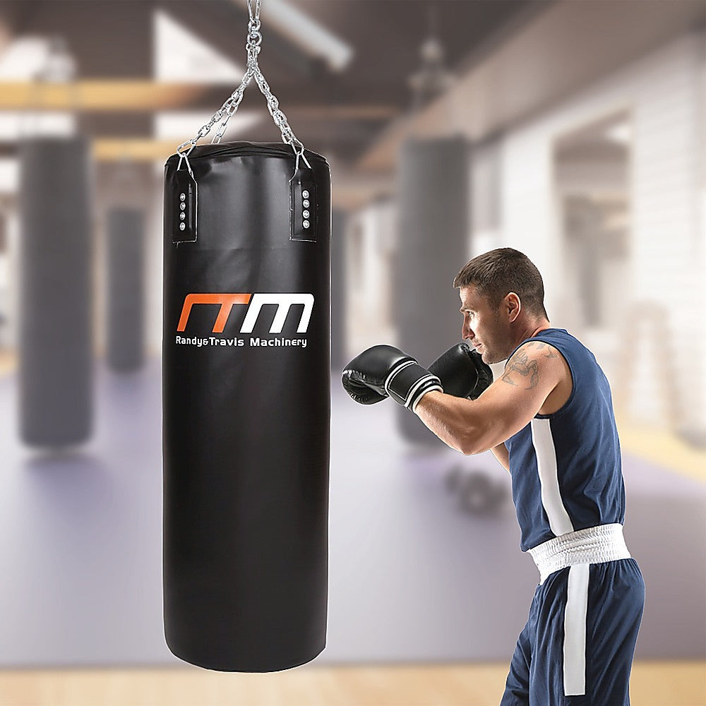 Black punching bag with Randy Travis Machinery logo on a white background