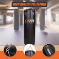 Black punching bag with RTM branding in a blurred indoor setting